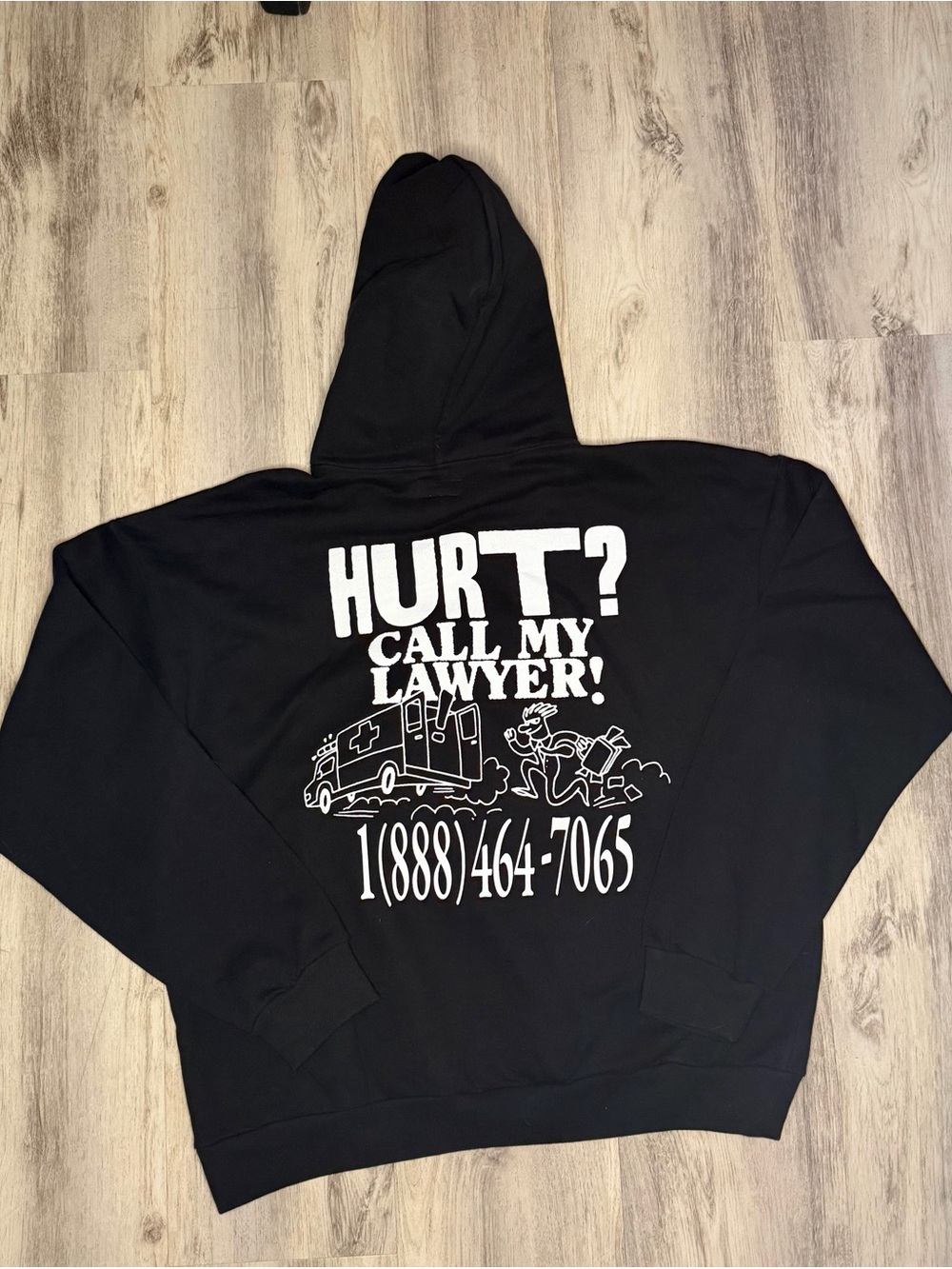 Black Market 'Hurt? Call My Lawyer' Hooded Sweatshirt